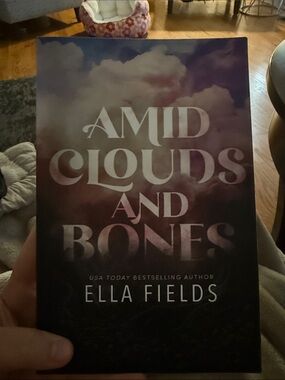 OOP Cover Amid Clouds and Bones by Ella Fields - Purple/Pink Ombre Paperback